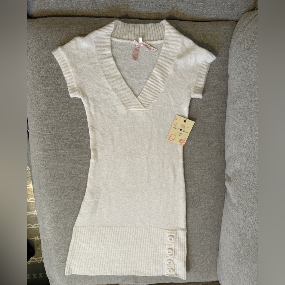 Sweater dress with button detail on the bottom new with tags